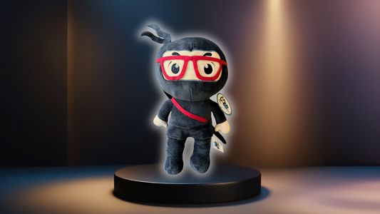 Plush toy with a mask and red glasses in front of a dark background.